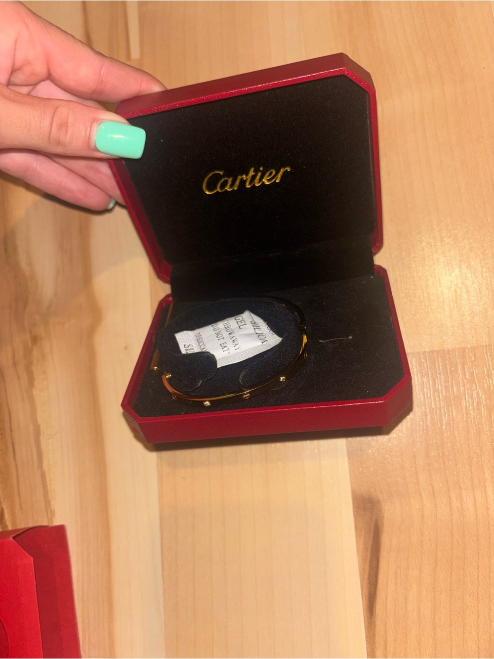 Cartier Gold Tone Screw Motif Bracelet with Red Case